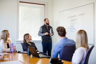 group looking at whiteboard