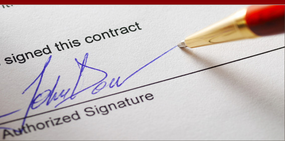 signing a construction contract
