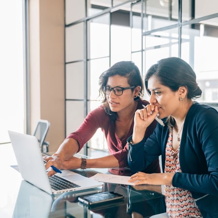 two_women_training_on_laptop