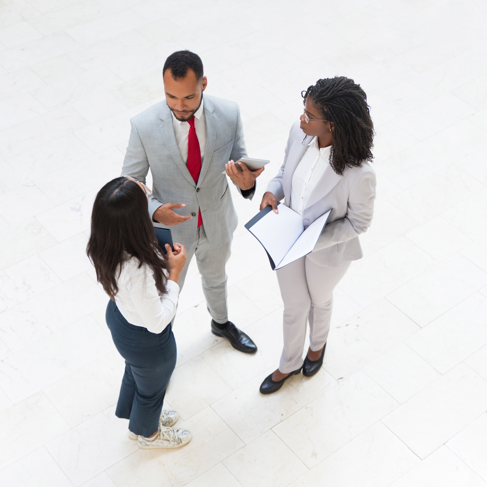 man_and_two_women_talking-1