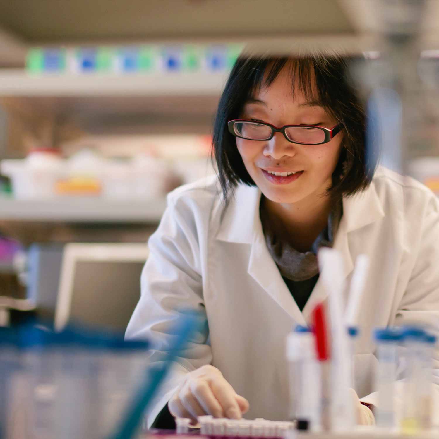 female_lab_worker_looking_at_samples